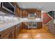 Gourmet kitchen featuring custom cabinetry, granite countertops, and stainless steel appliances at 541 The Preserve Trail Trl, Chapel Hill, NC 27517