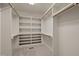 Spacious walk-in closet with custom shelving and ample storage space, perfect for organization at 541 The Preserve Trl, Chapel Hill, NC 27517