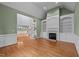 Living room with hardwood floors, fireplace, and custom built-ins offers plenty of space at 541 The Preserve Trl, Chapel Hill, NC 27517