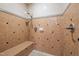 Walk-in shower featuring a built-in bench, tile surround, and modern shower head at 541 The Preserve Trl, Chapel Hill, NC 27517
