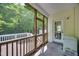 Enclosed back porch with a door leading to backyard at 5865 Forest Point Rd Rd, Raleigh, NC 27610