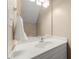 Clean bathroom featuring a white vanity, mirror, and fresh decor at 5865 Forest Point Rd Rd, Raleigh, NC 27610