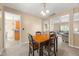 Dining room featuring a table set that connects to the kitchen and living room at 5865 Forest Point Rd Rd, Raleigh, NC 27610