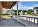 Spacious covered porch featuring classic white columns and a welcoming atmosphere at 5865 Forest Point Rd Rd, Raleigh, NC 27610