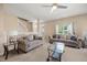 Bright living room featuring neutral tones, comfortable seating, and ample natural light at 5865 Forest Point Rd Rd, Raleigh, NC 27610