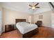 Spacious main bedroom with vaulted ceilings, hardwood floors, and en-suite bathroom at 5865 Forest Point Rd Rd, Raleigh, NC 27610