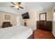 Spacious main bedroom with vaulted ceilings, hardwood floors, and en-suite bathroom at 5865 Forest Point Rd Rd, Raleigh, NC 27610