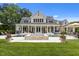 Expansive backyard featuring a pool, water feature, and covered patio with seating at 60 Hartwood Ln, Youngsville, NC 27596