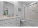 Clean bathroom with a shower-tub, marble countertop vanity, and white cabinets at 60 Hartwood Ln, Youngsville, NC 27596
