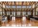 Spacious interior with vaulted ceilings, exposed beams, hardwood floors and abundant natural light at 60 Hartwood Ln, Youngsville, NC 27596