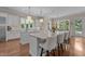 Bright kitchen with two islands, white cabinets, and granite countertops, perfect for entertaining at 60 Hartwood Ln, Youngsville, NC 27596