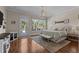 Spacious main bedroom with a walkout to the patio and a stylish decorative theme at 60 Hartwood Ln, Youngsville, NC 27596