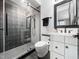 Beautiful bathroom featuring a glass shower, patterned tile, and modern vanity at 604 Dappled Pine Ave, Durham, NC 27713