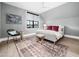 Relaxing bedroom with gray walls, plush rug, and natural light from the window at 604 Dappled Pine Ave, Durham, NC 27713