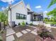 Exterior side view of a modern home with a lush landscaped yard at 604 Dappled Pine Ave, Durham, NC 27713