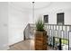 Foyer with a curving staircase and decorative planter in a wood accent pot at 604 Dappled Pine Ave, Durham, NC 27713