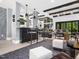 Bright and airy living room features open floor plan, hardwood floors, and designer finishes at 604 Dappled Pine Ave, Durham, NC 27713