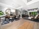 Open-concept living space connecting the dining area, kitchen, and lounge with modern finishes at 604 Dappled Pine Ave, Durham, NC 27713