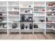 Organized walk-in pantry with floor-to-ceiling shelves and a variety of storage solutions at 604 Dappled Pine Ave, Durham, NC 27713