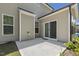 Back patio with sliding glass doors leading to backyard at 605 Hampton Crest Ct, Fuquay Varina, NC 27526