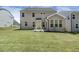 Backyard featuring green grass and a view of the house at 605 Hampton Crest Ct, Fuquay Varina, NC 27526