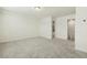 Large bedroom with neutral carpet and an open view into a bathroom at 605 Hampton Crest Ct, Fuquay Varina, NC 27526