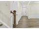 Bright foyer with hardwood floors, white trim, and a welcoming view of the front door at 605 Hampton Crest Ct, Fuquay Varina, NC 27526