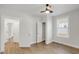Nice bedroom with ceiling fan, hardwood floors, neutral paint, and closet at 610 N Driver St, Durham, NC 27703