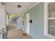 A view of the front porch with light blue siding and an inviting entrance at 610 N Driver St, Durham, NC 27703