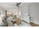 Spacious living area with a decorative fireplace, open floor plan, and natural light at 610 N Driver St, Durham, NC 27703