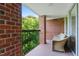 Outdoor balcony with brick and a comfortable seating area at 620 Martin Luther King Jr Blvd # Apt 502, Chapel Hill, NC 27514