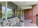 Inviting brick balcony with comfortable seating and sliding glass doors at 620 Martin Luther King Jr Blvd # Apt 502, Chapel Hill, NC 27514