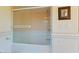 Bathroom with bathtub and tiled shower and walls at 620 Martin Luther King Jr Blvd # Apt 502, Chapel Hill, NC 27514