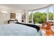 Sun-drenched bedroom with hardwood floors and bay window at 620 Martin Luther King Jr Blvd # Apt 502, Chapel Hill, NC 27514
