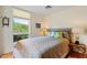 Well-lit bedroom featuring a comfortable bed, a view of the outdoors, and ample natural light at 620 Martin Luther King Jr Blvd # Apt 502, Chapel Hill, NC 27514