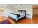 Comfortable bedroom with a king-size bed and views to bathroom at 620 Martin Luther King Jr Blvd # Apt 502, Chapel Hill, NC 27514