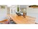 View to Dining area with hardwood table, unique fish sculpture, open to kitchen and living room at 620 Martin Luther King Jr Blvd # Apt 502, Chapel Hill, NC 27514