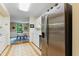 Eat-in kitchen with stainless steel refrigerator and dishwasher, plus views to dining room at 620 Martin Luther King Jr Blvd # Apt 502, Chapel Hill, NC 27514