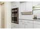 Modern kitchen featuring stainless steel appliances and crisp white cabinets, offering a clean and stylish design at 620 Martin Luther King Jr Blvd # Apt 502, Chapel Hill, NC 27514