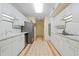 Well-lit kitchen with white cabinetry, stainless steel appliances, and tile flooring at 620 Martin Luther King Jr Blvd # Apt 502, Chapel Hill, NC 27514