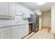 Bright kitchen with stainless steel appliances, white cabinets, and plenty of counter space at 620 Martin Luther King Jr Blvd # Apt 502, Chapel Hill, NC 27514
