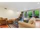 Cozy living room with a comfortable seating area, hardwood floors, and a bright view to the balcony at 620 Martin Luther King Jr Blvd # Apt 502, Chapel Hill, NC 27514