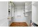 Spacious walk-in closet featuring custom shelving and a well-maintained hardwood floor at 620 Martin Luther King Jr Blvd # Apt 502, Chapel Hill, NC 27514