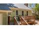 Charming back deck with outdoor seating offers a cozy space for relaxation and entertainment at 6904 Sandringham Dr, Raleigh, NC 27613