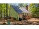 Back exterior view showing the deck, grill and AC unit at 6904 Sandringham Dr, Raleigh, NC 27613
