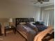 Spacious bedroom with a ceiling fan and large bed at 713 Beddingfield Dr, Knightdale, NC 27545