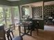 Breakfast nook with bright windows, wood floors and glass top table at 713 Beddingfield Dr, Knightdale, NC 27545