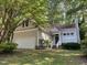 Charming single-Gathering home with a two-car garage and well-maintained front yard at 713 Beddingfield Dr, Knightdale, NC 27545
