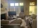 Cozy living room with a fireplace and comfortable seating arrangements at 713 Beddingfield Dr, Knightdale, NC 27545