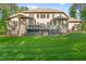 Expansive backyard featuring a spacious deck perfect for outdoor entertaining at 7544 Hasentree Club Dr, Wake Forest, NC 27587